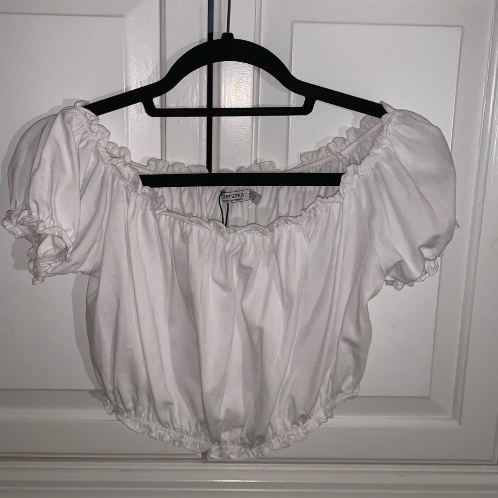 ruffled white shirt!